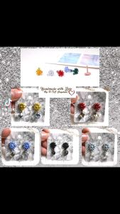 [D.T.C Crystals] Alloy Flower Earstuds with Swarovski Crystals.