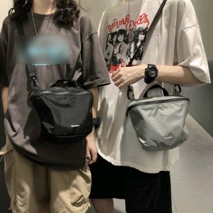 FDHT กระเป๋า Crossbody ถุงไนลอนแข็ง กระเป๋าสะพายไหล่แบบสั้น สไตล์เกาหลีแบบ กระเป๋าทรงเต่า ง่ายๆ สีทึบทึบ กระเป๋าเปลือกหอยเรียบง่าย กีฬากีฬากีฬา