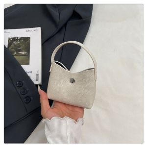 SEA YADOU  กระเป๋าใบเล็กหิ้วสไตล์เกาหลี INS กระเป๋าผู้หญิงรุ่นใหม่สไตล์ตะวันตกซองอั่งเปากระเป๋าแฟชั่นสำหรับออกนอกบ้าน