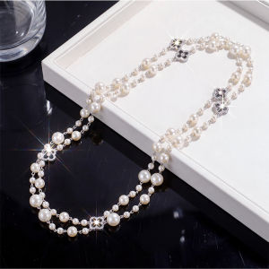 Korean-style four-leaf clover pearl necklace long light luxury high-end feel versatile and simple sweater chain autumn and winter necklace accessory 2026
