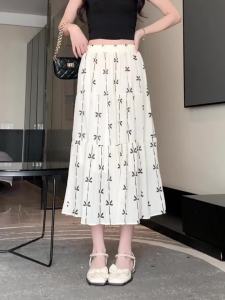 AMMIN กระโปรงลดรอบเอวพิมพ์ลายโบว์สำหรับผู้หญิงกระโปรงเอวสูงทรงเอฉบับภาษาเกาหลีเอวยางยืดสำหรับฤดูร้อน2024