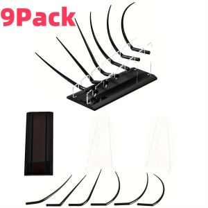 9-piece false eyelash display set with stand ideal for beauty salons. Used for demonstrating eyelash curling techniques. A model for practicing professional makeup application. Beauty accessory.