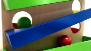 Wooden Knocks the Ball