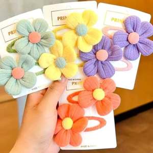 LHS.PH Flower-shaped hair clips in purple pink green yellow colors with felt petals and metal clips.