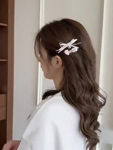 Sweet and adorable strawberry bow hair clips perfect for a feminine style adorned with rhinestones. New 2026 model of duckbill hair clips for the front of the hair.