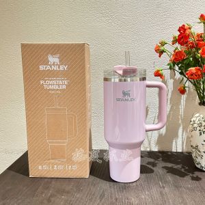original stanley Insulated cup in pearlescent blue and pearlescent pink with straw