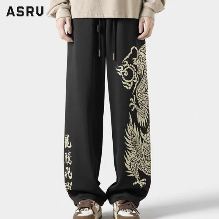 SINRANSINYA丨Loose straight casual dragon print trousers for men in the ...