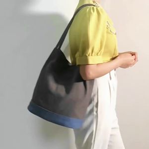 2026 Vintage canvas bag artistic and unique bucket bag for women single-shoulder womens canvas bag wholesale simple and versatile
