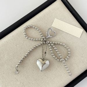 COD Cute Bow Pearl Phone Accessory With Heart Shaped Pendant Camera Bag Keychain