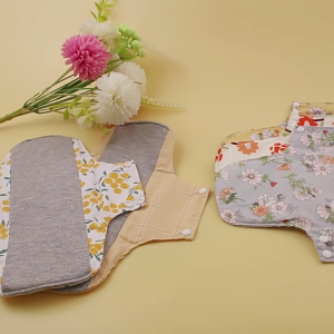 เพิ่มกราฟีนที่ผสมแผ่นซับปัสสาวะรั่วด้วยสารป้องกันการรั่วซึมดูดซับระบายอากาศได้สำหรับผิวที่ไวต่อการสัมผัส