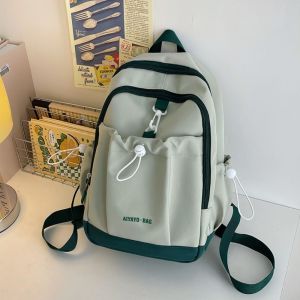 COPOTIYA แข็งและแข็งแรง กระเป๋าเป้สะพายหลังสีตัดกัน ไนลอนทำจากไนลอน ถุงหูรูด กระเป๋านักเรียนของนักเรียน คาวาอิ จุได้มาก กระเป๋าสะพายไหล่แบบสั้น กิจกรรมกลางแจ้งกลางแจ้ง