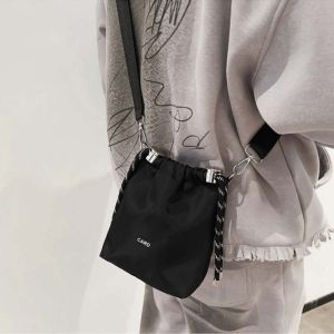 Phong cách Hàn Quốc Túi dây rút màu đen Túi đeo một bên vai INS cầm tay Nylon Túi đeo chéo thời trang sang trọng2026