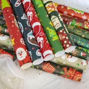 JDL CHRISTMAS GIFT WRAPPERs COATED AND GLOSSY PAPER SHIP WITH RANDOM DESIGN (SOLD PER 102550 PCS)