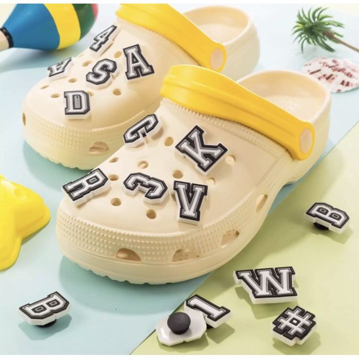 Yellow crocs 2024 with pins