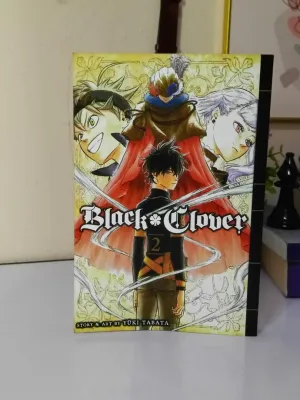 Black Clover Volume 2 by Tashiro Kuroko. Fantasy manga with illustrated characters. Used comic / manga secondhand in good condition and cheap