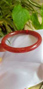 Vòng Cẩm Thạch Đỏ đẹp 58mm x chột 7mm màu đỏ đậm bóng là màu chiến thắng chuẩn hợp nữ mạng hỏa mạng thổ 55kg - 68kg đeo đẹp tay may mắn tốt sức khỏe công việc rực rỡ tài lộc có 800k ạ