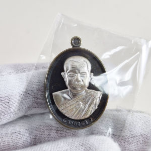 Rian Metta Phra Ajarn Suriyan. Nawa metal with Silver Mask. Code 89