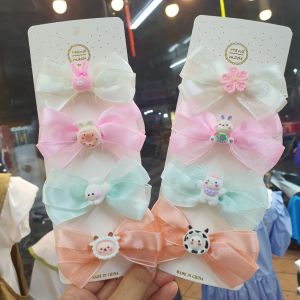Set 4 kẹp tóc nơ xinh xắn cho bé gái Set 4 kẹp tóc handmade nhiều màu xinh cho bé gái