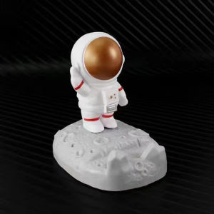 Hot selling astronaut creative desktop ornaments cute astronaut lazy drama chasing artifact mobile phone holder⚡PH deliveryIn stock⚡