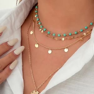 AE European and American Ornament Retro ethnic style Turquoise beaded collarbone necklace for women with floral pendant and elegant tassels