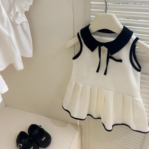 Gấu lãnh đạo quần áo trẻ em bé gái mùa hè Polo Dresses 2 3 4 5 6 7 năm con không tay dễ thương Bow mặc giản dị Ăn mặc