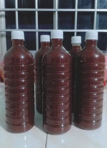 Nước cốt trái nhàu ngâm đường phèn đã lọc hạt chỉ lấy thịt nhàu và nước