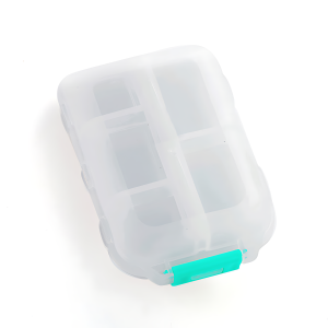 Portable pill box with transparent compartments for quick access and visible dosage. Fits in sports and outdoor activities equipment. Ideal for cycling bike accessories.