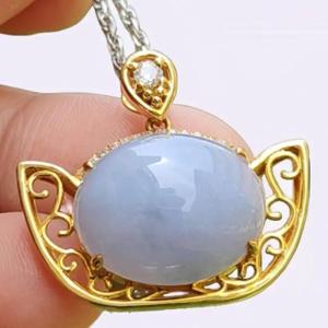 High Quality Lavender Natural Type A Jadeite Jade crafted as cabochon size 12.7 * 15.6 * 6 mm set on 18k gold with diamonds as Pendant certificate weighs 4.47 grams measurement 21.2 * 24.1 * 9 mm (18kp45)