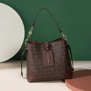 MKF Large Capacity Bag for Women 2026 Trendy niche bucket bag with contrasting colors crossbody shoulder bag in European and American retro style