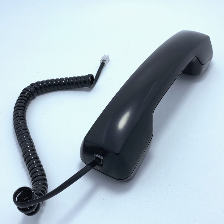 Ordinary telephone microphone handle with curved telephone handset ...