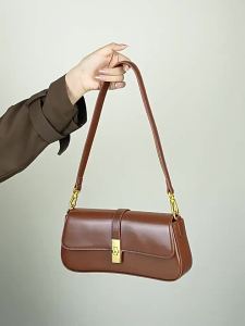 Light luxury genuine leather structured baguette bag with French-style flap and metal twist clasp suitable for daily commuting as a shoulder or crossbody bag #71503