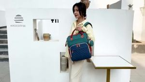 2025 กระเป๋าคุณแม่แฟชั่นใหม่เตียงพับเด็กกระเป๋าเป้สะพายหลังความจุขนาดใหญ่