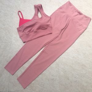 B027 -  Bộ tập quần dài ôm chỉ nổ 2 túi sau bra lệch vai phối màu có sẵn mút thể thao tập gym yoga nữ