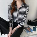 Kemeja Wanita Garis Hitam Putih Lengan Panjang Ganjar Pranowo Korean Style Kekinian Baju Motif Salur Black White Import Casual Pakaian Wanita  Blouse Stripe Oversize Jumbo Big Size Korea Style Terbaru Murah Katun Rayon Shakila Premium Hem Cewek Basic. 