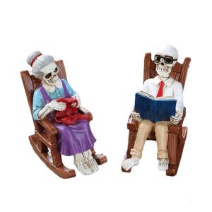 รูปปั้นคู่รักโครงกระดูกแนววินเทจพร้อมกล่องเก็บและแสดงเครื่องประดับชั้นหนังสือและเปิดหนังสือและการออกแบบเก้าอี้โยกฮาโลวีน