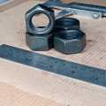MUR KUNCI 32 M22 BAJA HITAM UNTUK BAUT 32 M22 PITCH DRAT 2.5 DIAMETER LUAR 32MM DIAMETER DALAM LUBANG 22MM. 