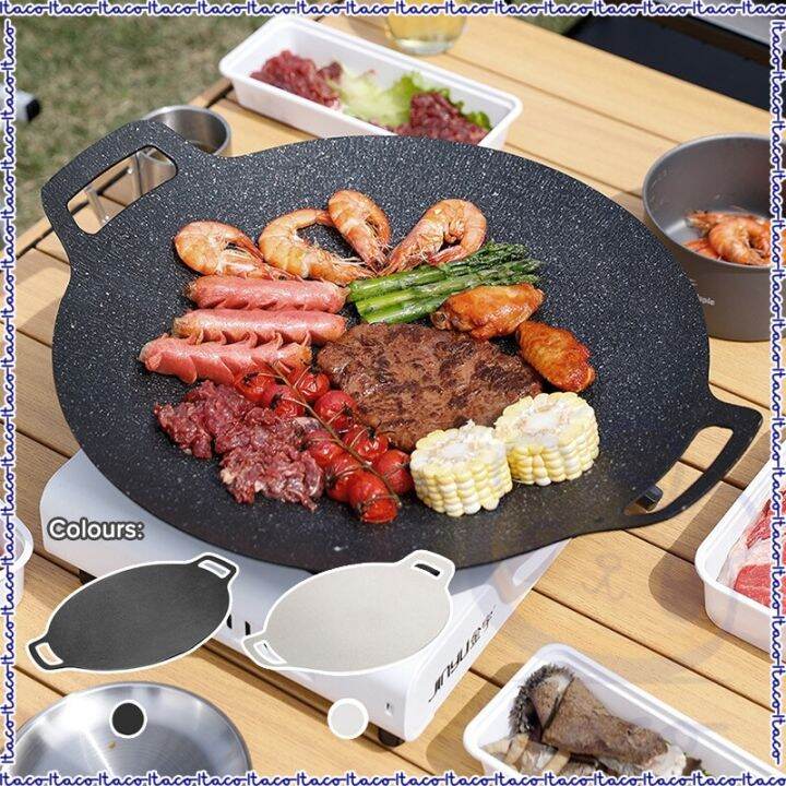 Camping grill outlet with griddle