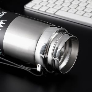 1000มิลลิลิตรมือถือป้องกันน้ำร้อนลวกร้อนถ้วย316ถ้วยสแตนเลสที่มีเชือกแขวนความจุขนาดใหญ่ถ้วยสูญญากาศกลางแจ้งแบบพกพารั่วหลักฐานการออกแบบของรถถ้วยเย็นและร้อนเครื่องดื่มน้ำผลไม้ดอกไม้ชาถ้วย