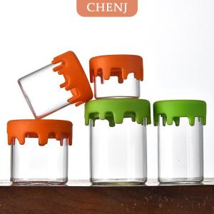 [COD] CHENJ ขวดโหลแก้วพร้อมฝาปิดทำจากซิลิโคน2ชิ้นภาชนะบรรจุขี้ผึ้งกล่องเก็บของในห้องครัวอุปกรณ์เสริมสำหรับสมุนไพรยาสูบขวดเปล่า