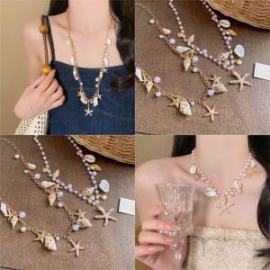 Đeo vòng cổ ốc sao là có ngay vibe biển cực chill