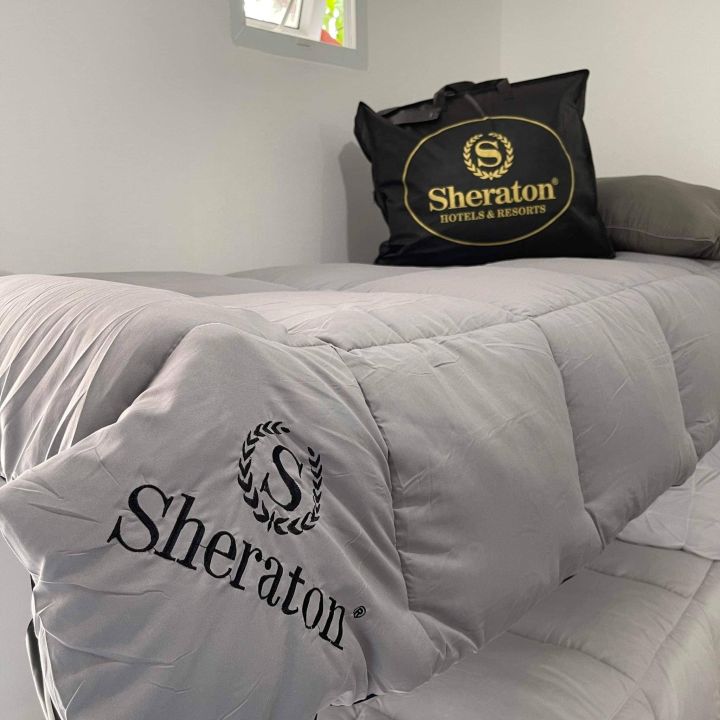 a Hilton/ Sheraton 2KG Quality Modern Stylish Comforter Filler / Duvet Filler / Quilt Filler