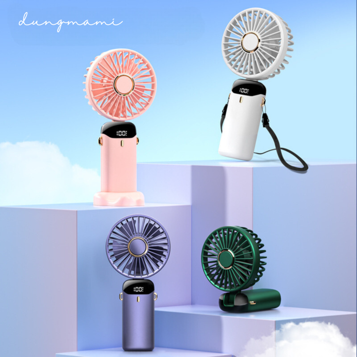 Quạt cầm tay mini thời trang 5 cấp gió, có hiển thị mức pin, có thể gập cổ, kèm đế để bàn, dây đeo cổ, động cơ mạnh, êm, 2 pin dùng lâu đến 11 tiếng, nhỏ gọn bỏ vừa trong giỏ xách