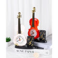 Đồng hồ báo thức để bàn kèm hộp đựng bút hình cây đàn violin dùng trang trí decor bàn học hay bàn làm việc. 