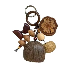 NEXTYOO Vỏ hạt tự nhiên Chuông vỏ hạt dẻ Làm thủ công Quay bằng tay  dây chuyền vỏ trái cây tự nhiên  Âm thanh chuông reo Chuông treo Phụ Kiện Ba Lô