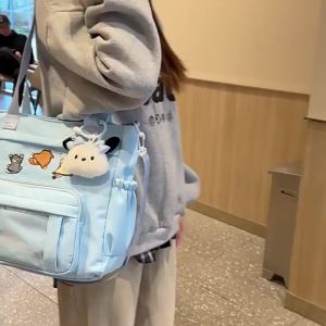 กระเป๋าสะพายข้างผ้าแคนวาสสำหรับผู้หญิง 2025 สไตล์ญี่ปุ่นใหม่ กระเป๋าสะพายไหล่ความจุขนาดใหญ่สำหรับวัยรุ่นและนักเรียนมัธยม กระเป๋าถือ