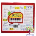 Đàn organ mini có tay cầm Toyroyal. 
