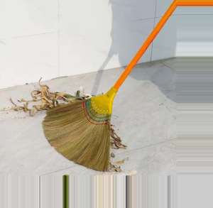 Luckylkh Yellow-handled broom with natural bristles for sweeping debris on tiled floor.