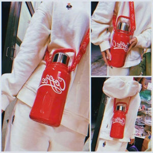 Bình Nước Giữ Nhiệt Inox 304 Coca Cola 1200ml Có Quai Sách Tiện Dụng