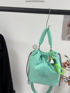 ALO WomenDrawstring Bucket Bag Padded Soft Top Handle Detachable Wide Crossbody Strap With Cute Charm Pendant Nylon Casual Hand Sling Bag