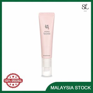 CROWNNA 24K Gold Brightening Cream 0-5 key attributes: 24K gold brightening skin care tube packaging pink design. 0-2 scene: skincare routine beauty product display.